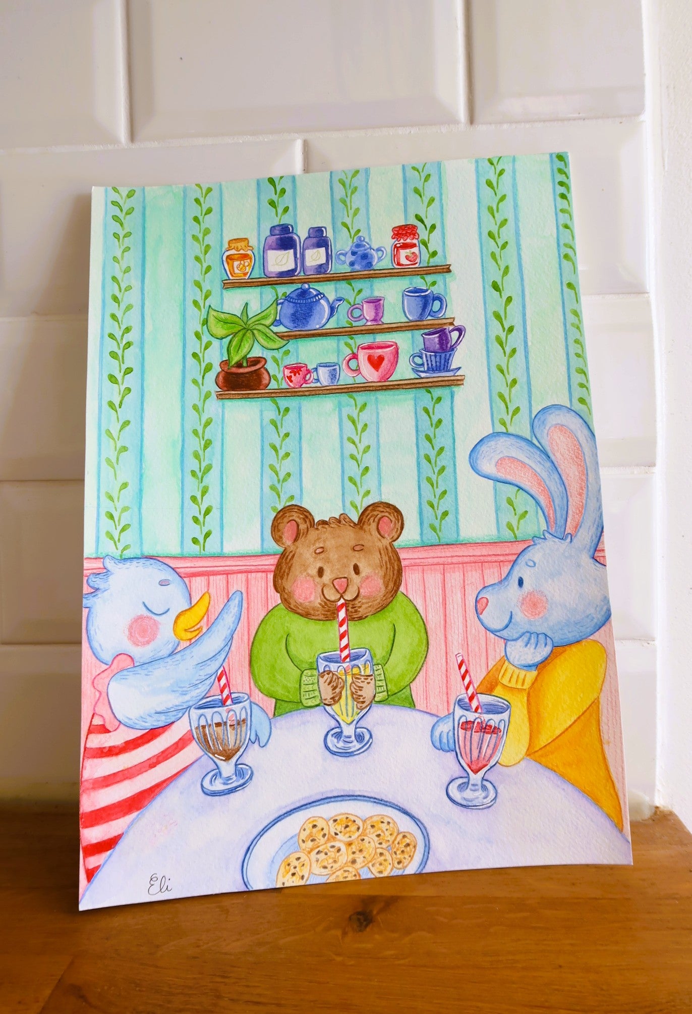 Trois amis gourmands au café